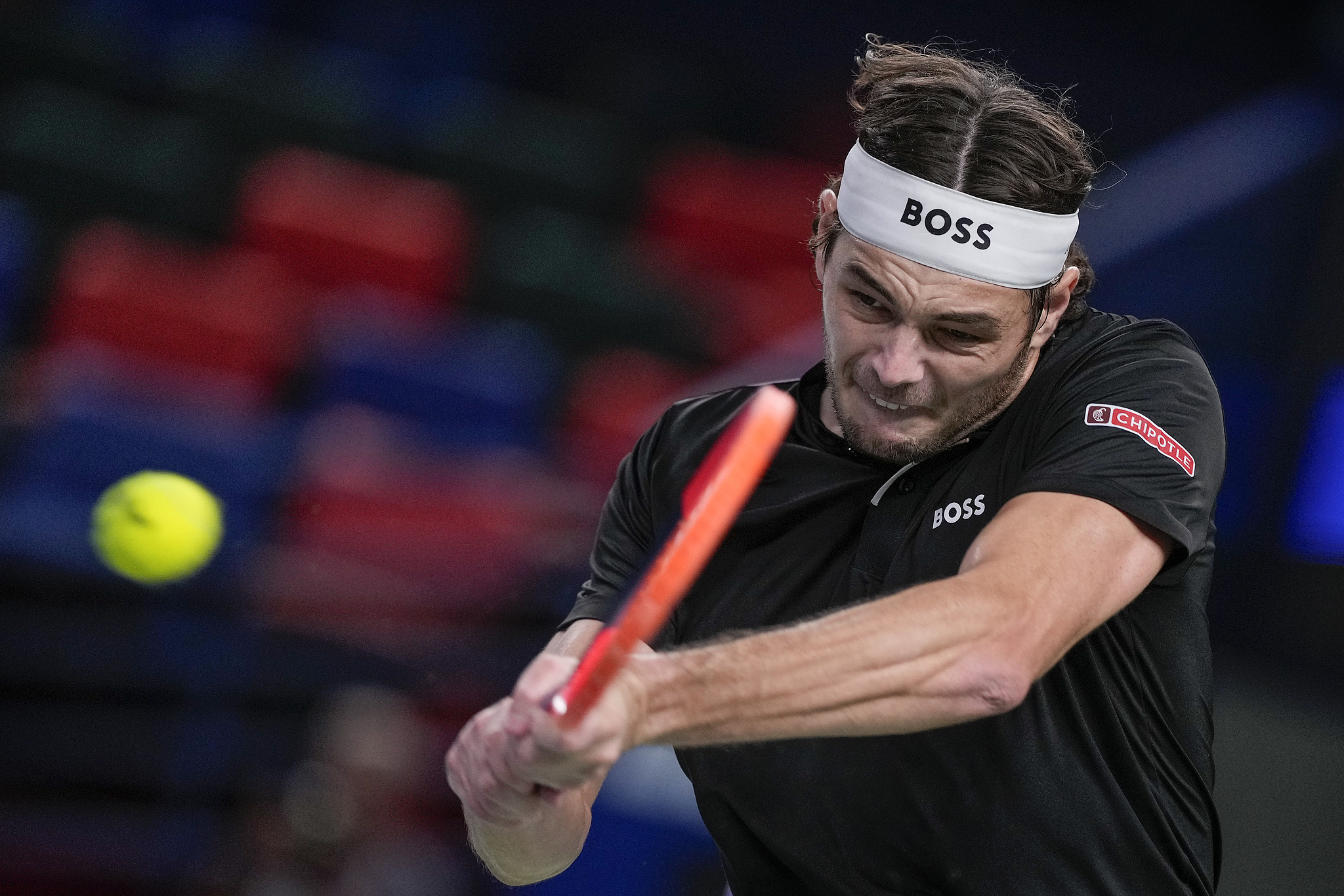 Taylor Fritz of the U.S. hits a shot in the men's singles match against Terence Atmane of France at the Shanghai Masters in east China's Shanghai Municipality, October 7, 2024. /CFP