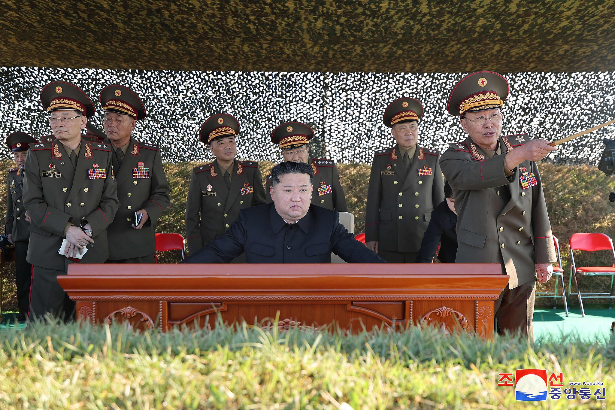 Democratic People's Republic of Korea (DPRK)'s top leader Kim Jong Un inspects the live artillery firing by graduates of O Jin U Artillery Academy at an undisclosed location in the DPRK, October 6, 2024. /CFP