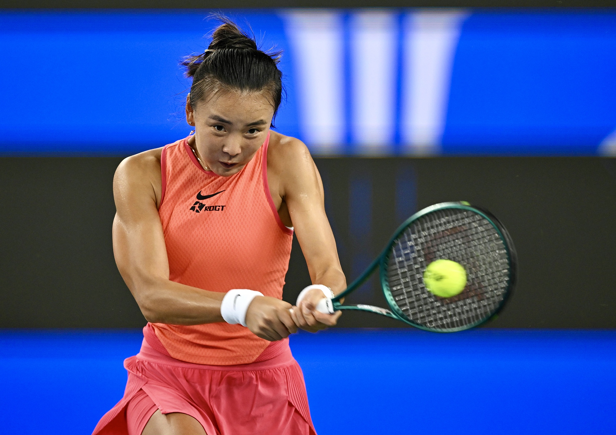 Yuan Yue of China hits a shot in the women's singles match against Clara Burel of France at the Wuhan Open in Wuhan, central China's Hubei Province, October 7, 2024. /CFP