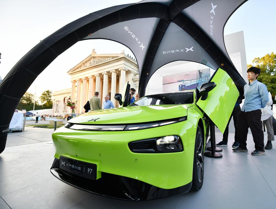 People visit the booth of Chinese carmaker XPeng during the 2023 International Motor Show in Munich, Germany, September 5, 2023. /Xinhua