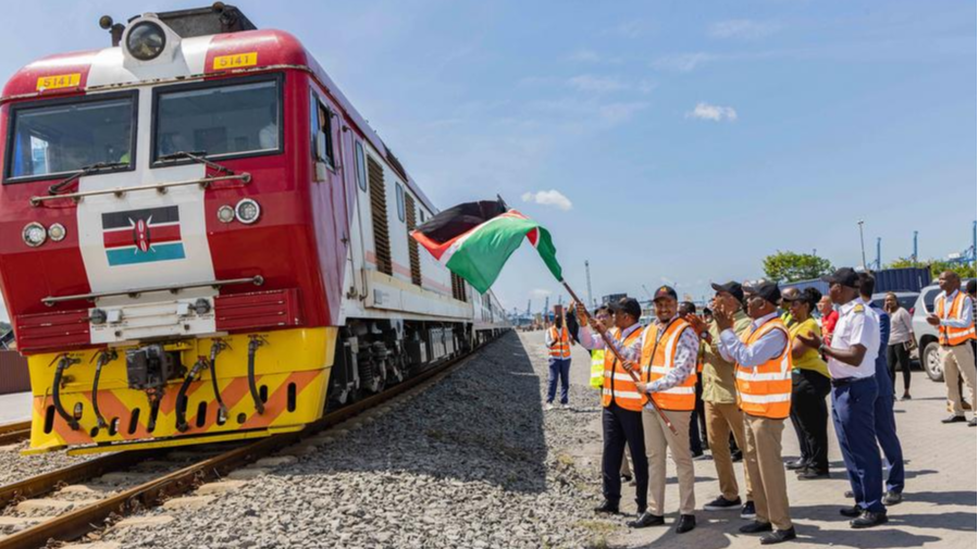 Mohamed Daghar (R, Front), principal secretary in the Ministry of Roads and Transport, flags off new passenger coaches from China at Kenya's port city of Mombasa, July 22, 2024. /Xinhua