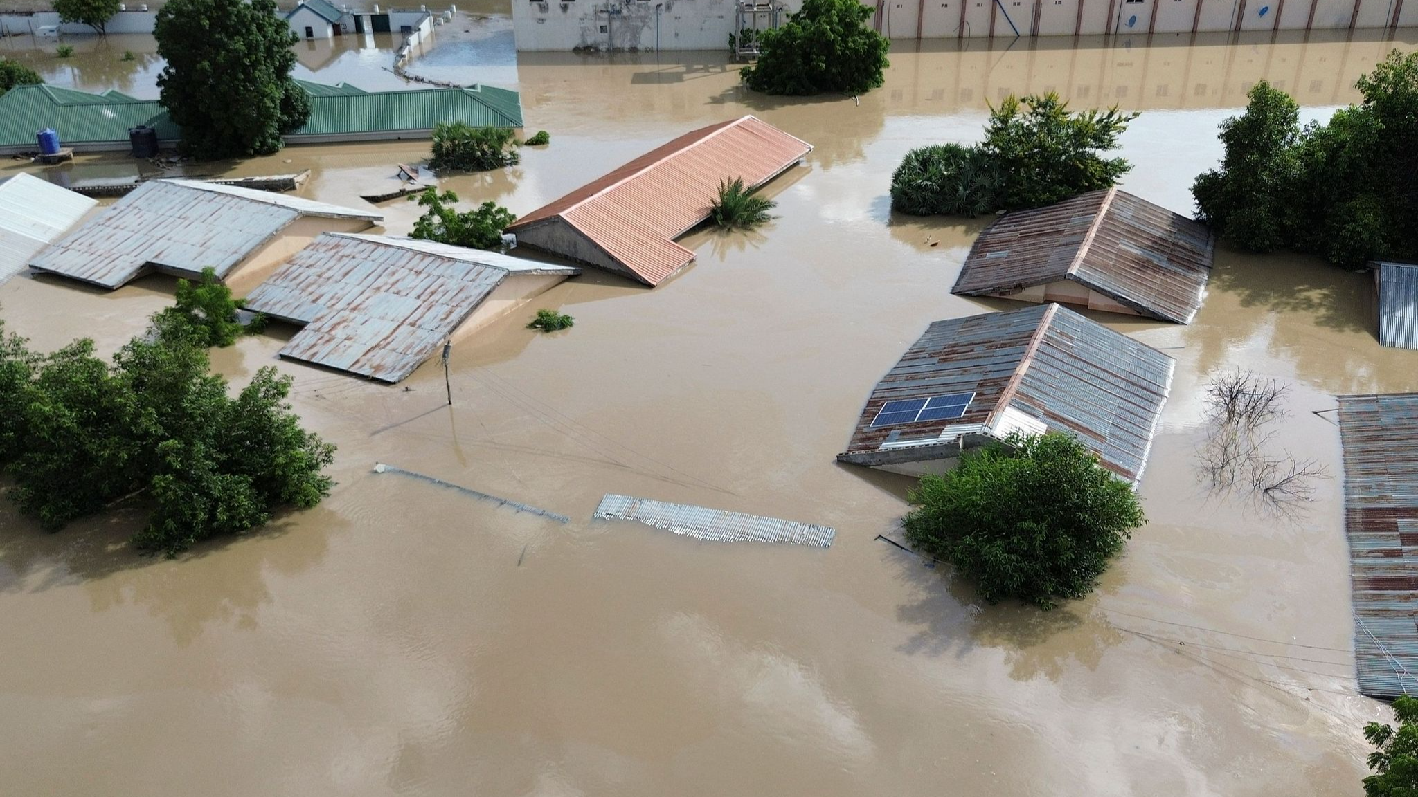 Houses submerged under flood water from an overflowing dam in Maiduguri, capital of Borno state in northeast Nigeria, September 10, 2024. /CFP