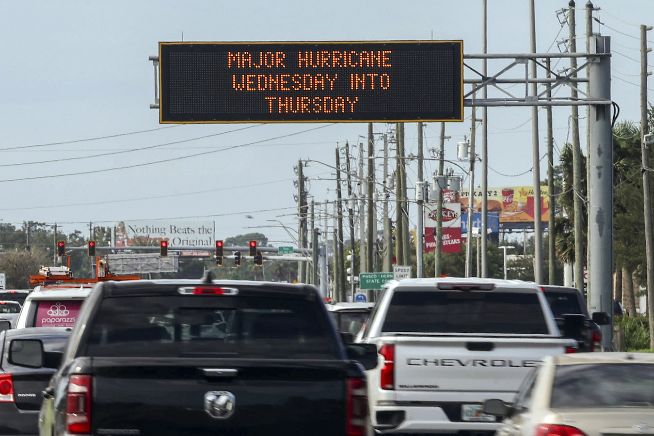 Highway signage announces the impending arrival of Hurricane Milton and the evacuations zones in Port Richey, Florida, the U.S., October 8, 2024. /CFP