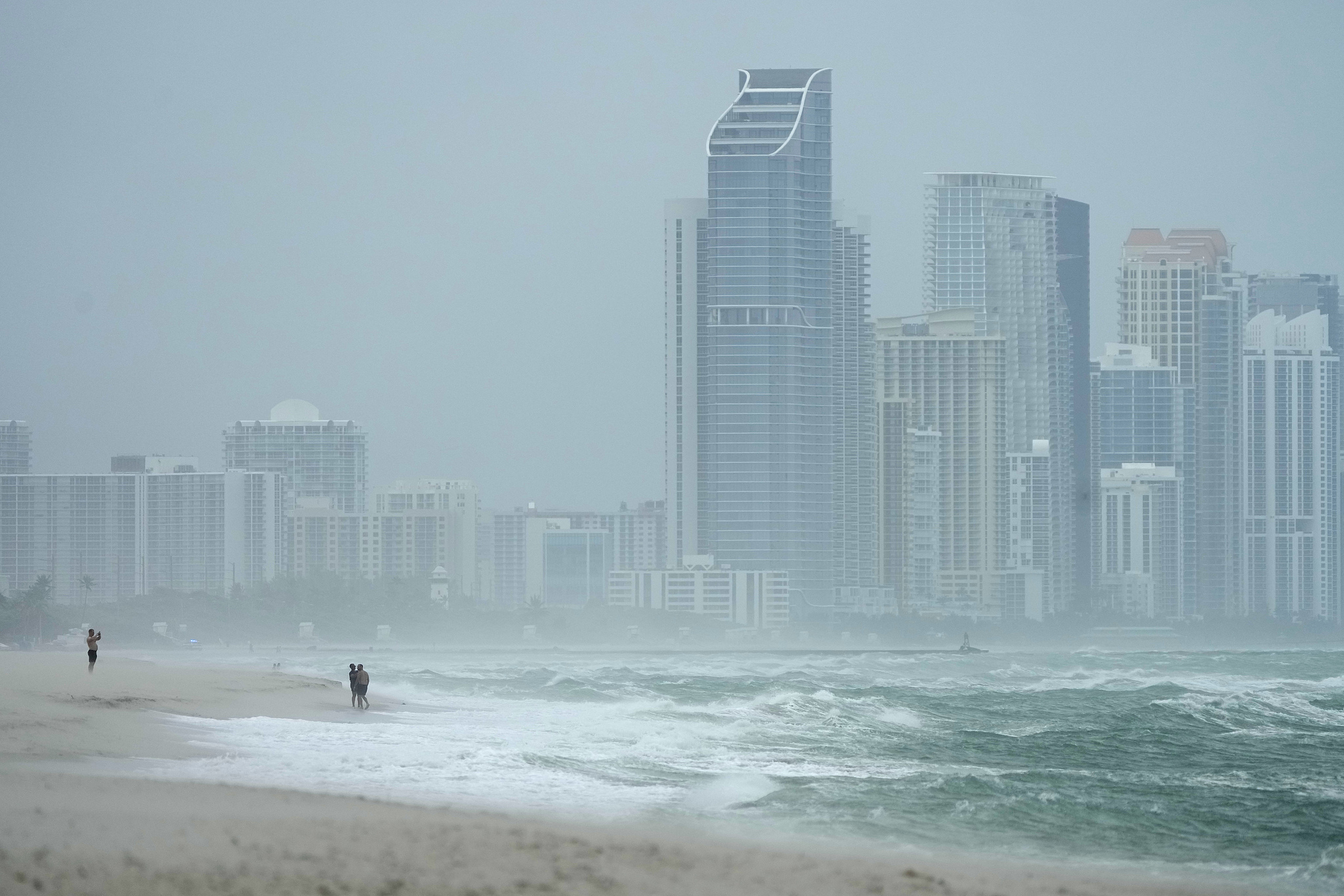 The city of Sunny Isles Beach is seen from Surfside as the outer bands of Hurricane Milton kick up the sand, Florida, the U.S., October 9, 2024. /CFP