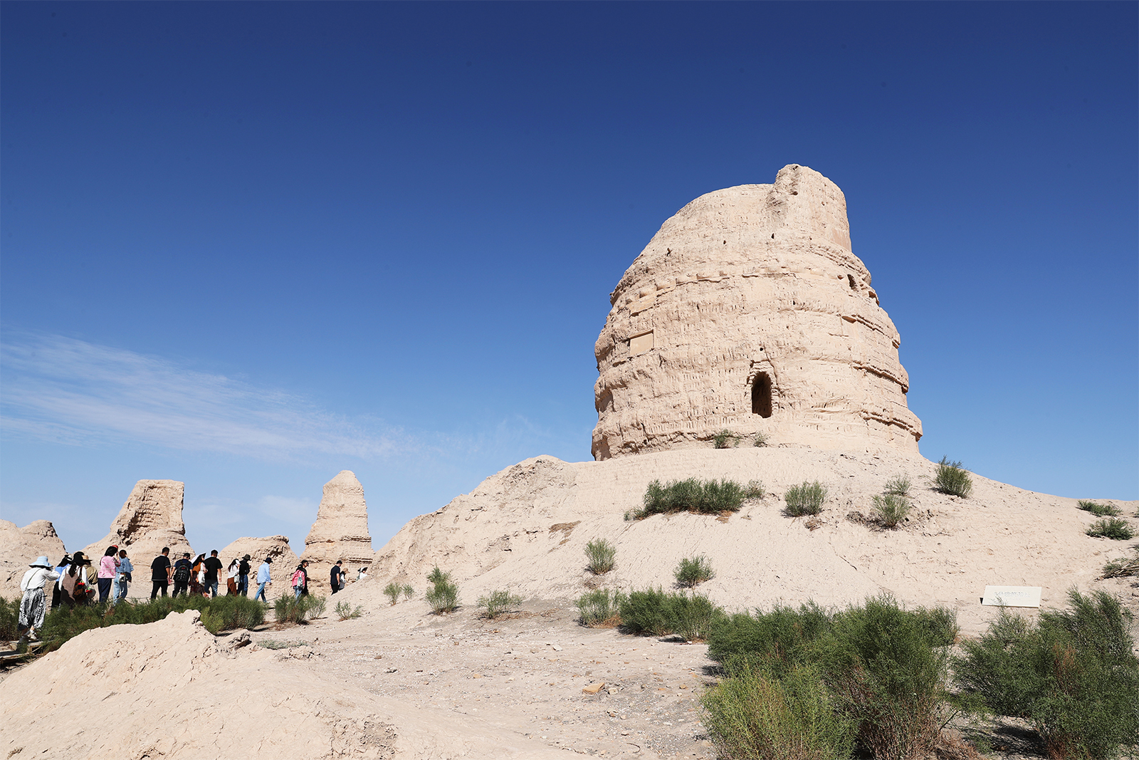 People visit the remnants of the Ta'er Temple, an important Buddhist temple at the Suoyang City site in Guazhou County, Gansu Province. /CGTN