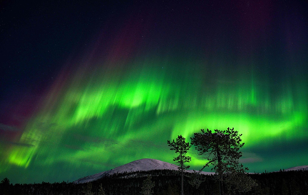 An aurora borealis illuminates the night sky, Kolari, Finland, January 15, 2022. /CFP