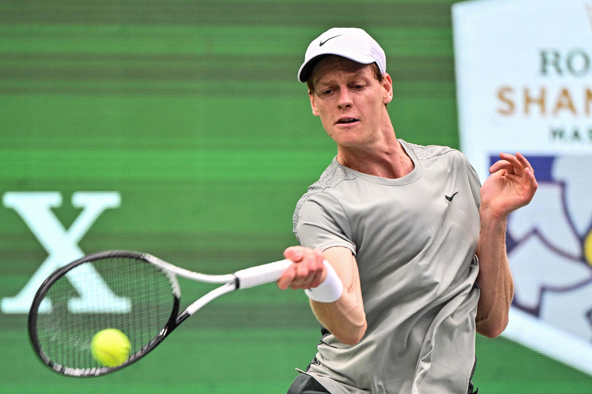 Jannik Sinner of Italy hits a shot against Daniil Medvedev of Russia in the men's singles quarterfinals at the Shanghai Masters in east China's Shanghai Municipality, October 10, 2024. /CFP