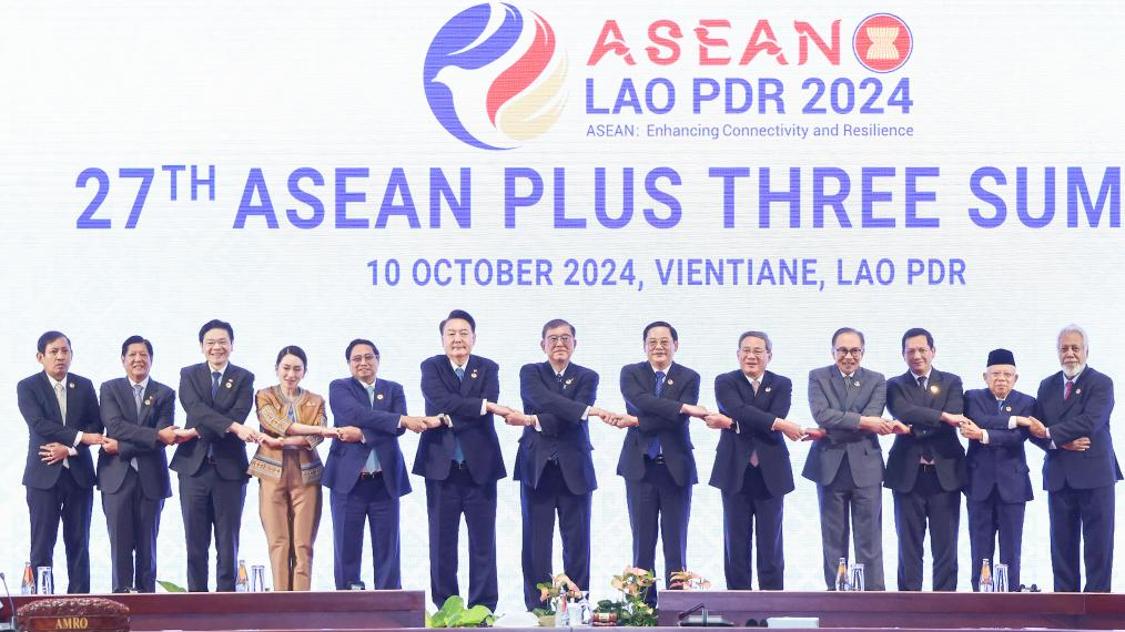 Chinese Premier Li Qiang (5th R) poses for a group photo before the 27th ASEAN Plus Three Summit in Vientiane, Laos, October 10, 2024. /Xinhua