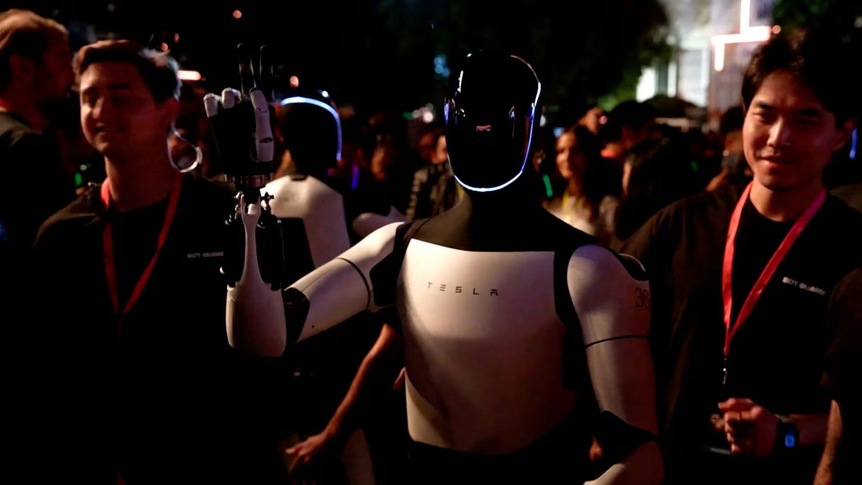 Tesla's Optimus robot gestures on the day of an unveiling event in Los Angeles, U.S., October 10, 2024. /Tesla handout via Reuters