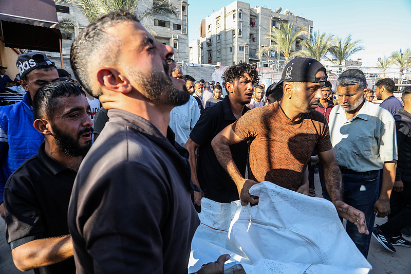 Relatives of Palestinians who lost their life due to Israeli attacks mourn as the bodies are brought to the Nasser Hospital for funeral works in Khan Yunis, Gaza, October 10, 2024. /CFP