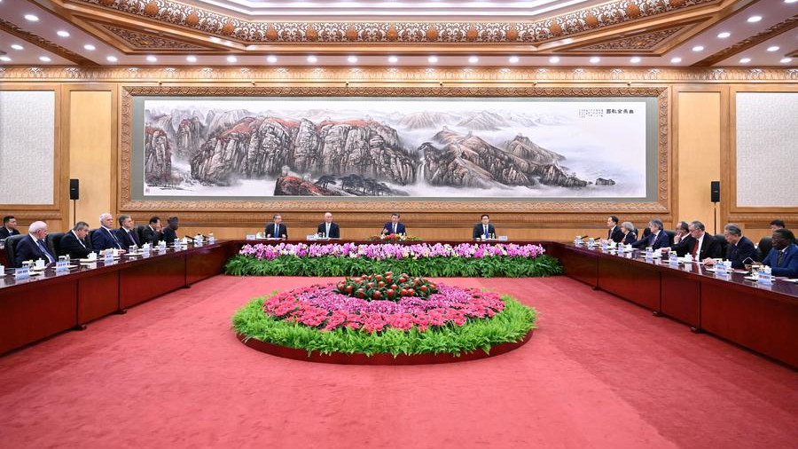 Chinese President Xi Jinping meets with foreign guests attending the China International Friendship Conference and the conference marking the 70th founding anniversary of the Chinese People's Association for Friendship with Foreign Countries at the Great Hall of the People in Beijing, China, October 11, 2024. /Xinhua