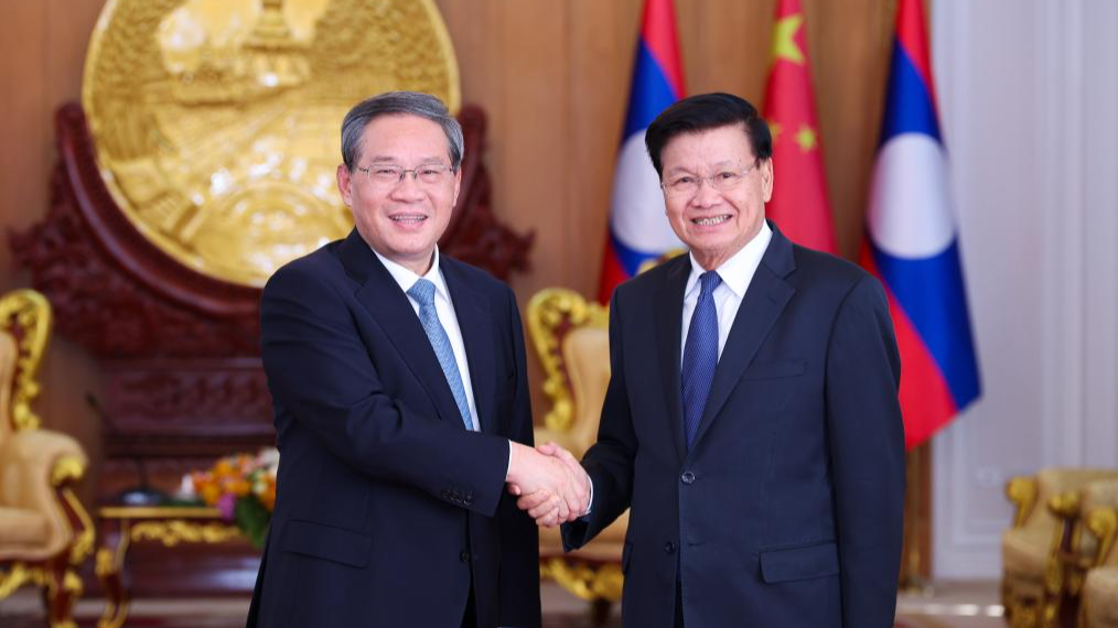 Chinese Premier Li Qiang (L) meets with General Secretary of the Lao People's Revolutionary Party Central Committee and Lao President Thongloun Sisoulith in Vientiane, Laos, October 11, 2024. /Xinhua