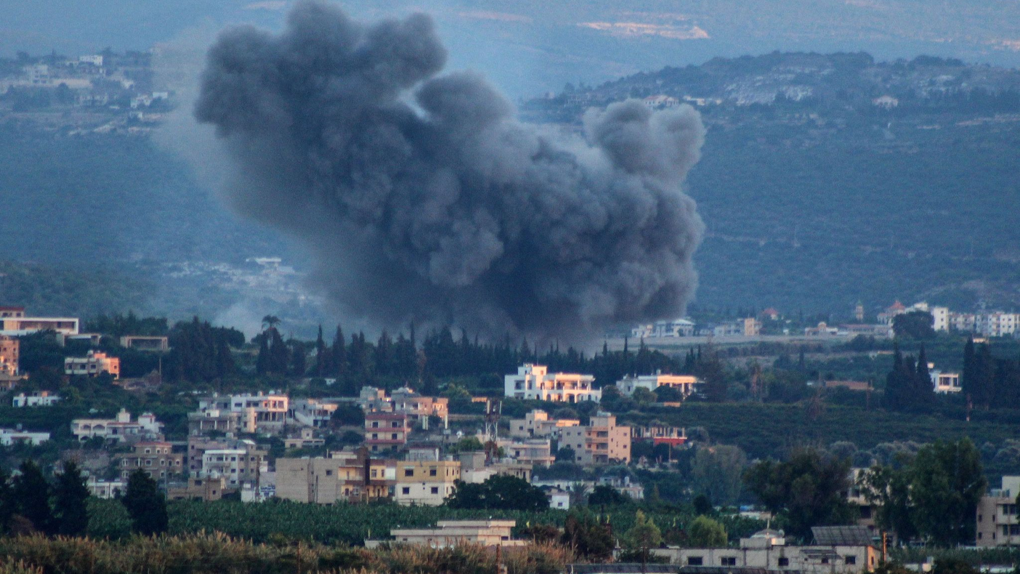 Smoke rises during Israeli strikes on villages overlooking the southern  Lebanese city of Tyre, October 11, 2024. /CFP