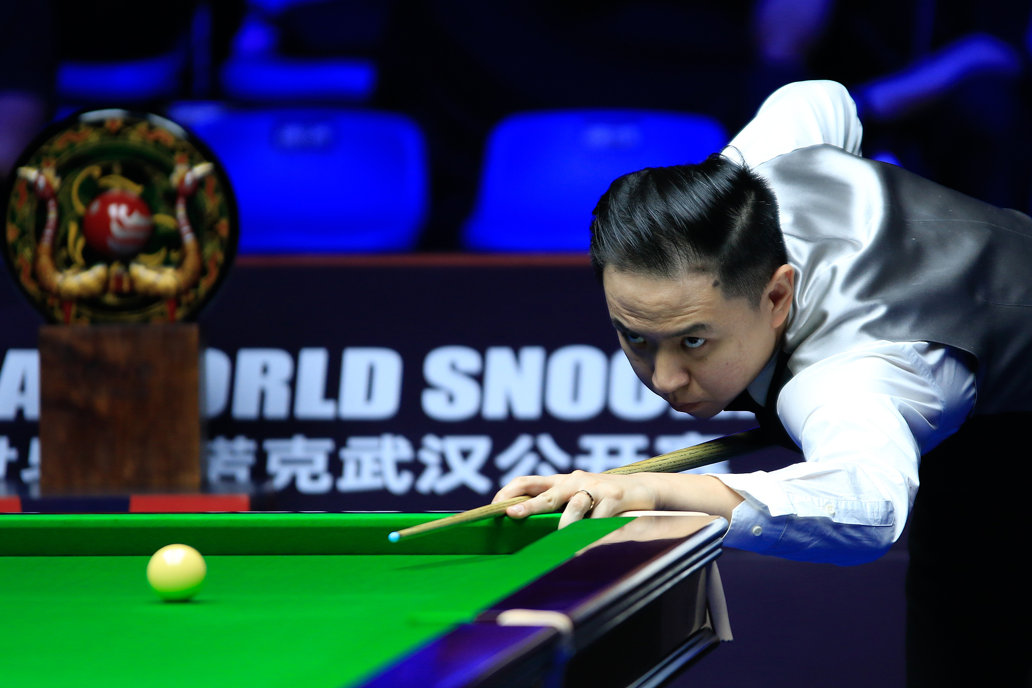 Xiao Guodong of China prepares to take a shot against Si Jiahui of China in the final at the Wuhan Open in Wuhan, central China's Hubei Province, October 12, 2024. /CFP