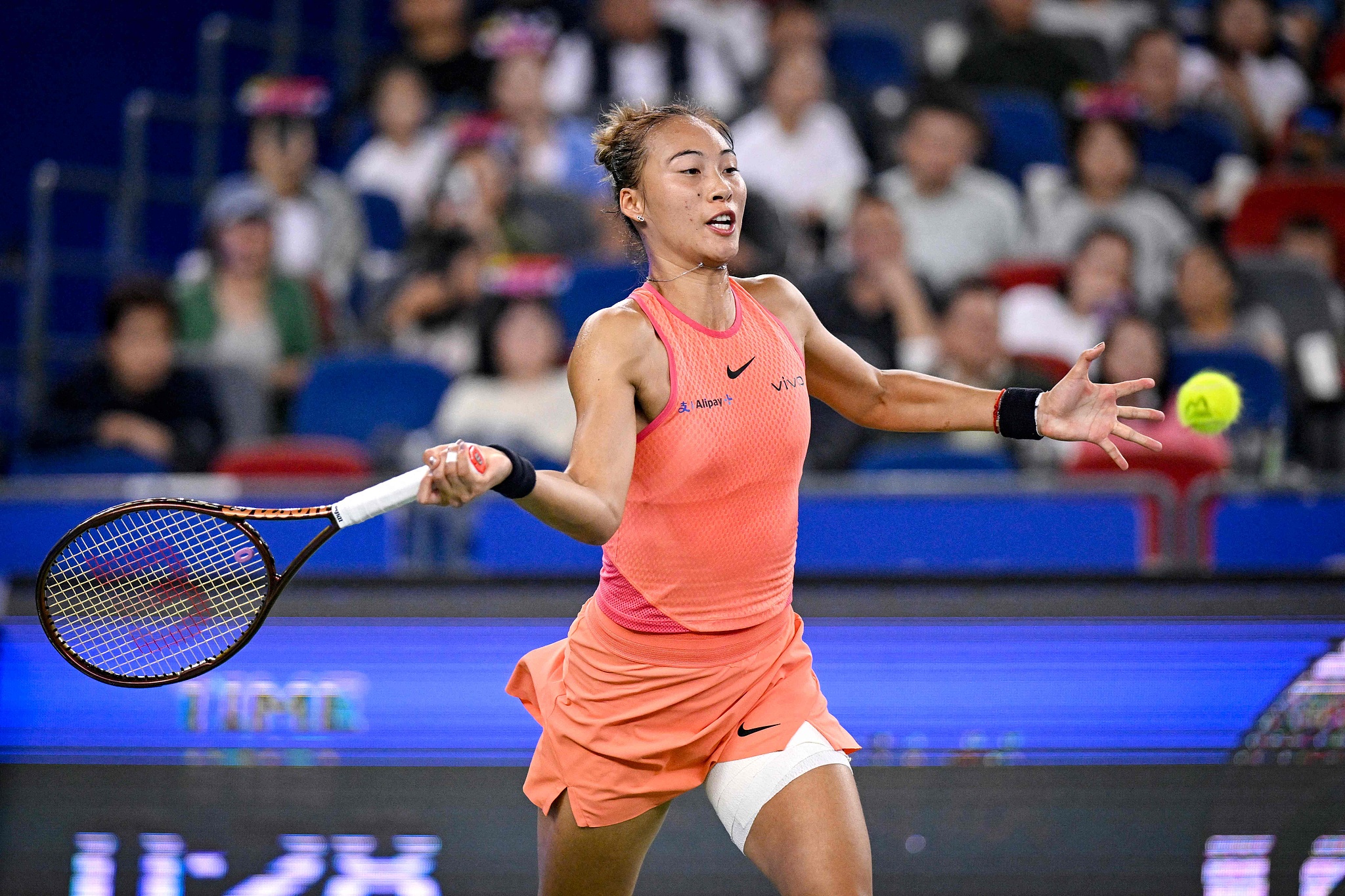 Zheng Qinwen of China tries to hit a shot in the women's singles final against Aryna Sabalenka of Belarus at the Wuhan Open in Wuhan, central China's Hubei Province, October 13, 2024. /CFP