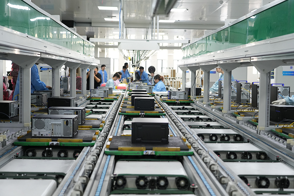 A computer mainframe is being produced from a semi-automated assembly line in a factory in Jinhua, Zhejiang Province, October 14, 2024. /CFP