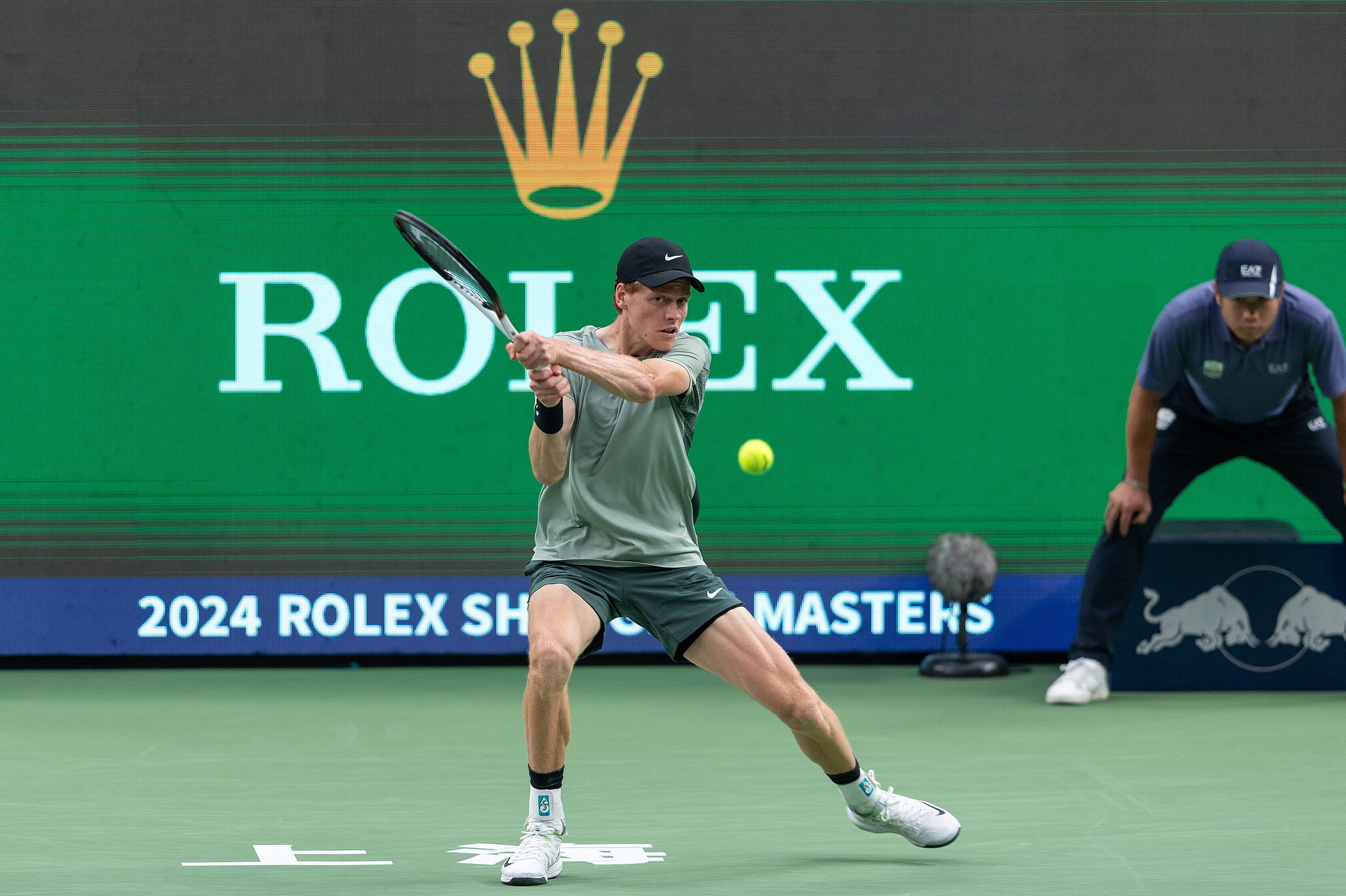 Jannik Sinner of Italy hits a shot in the men's singles final against Novak Djokovic of Serbia at the Shanghai Masters in east China's Shanghai Municipality , October 13, 2024. /CFP