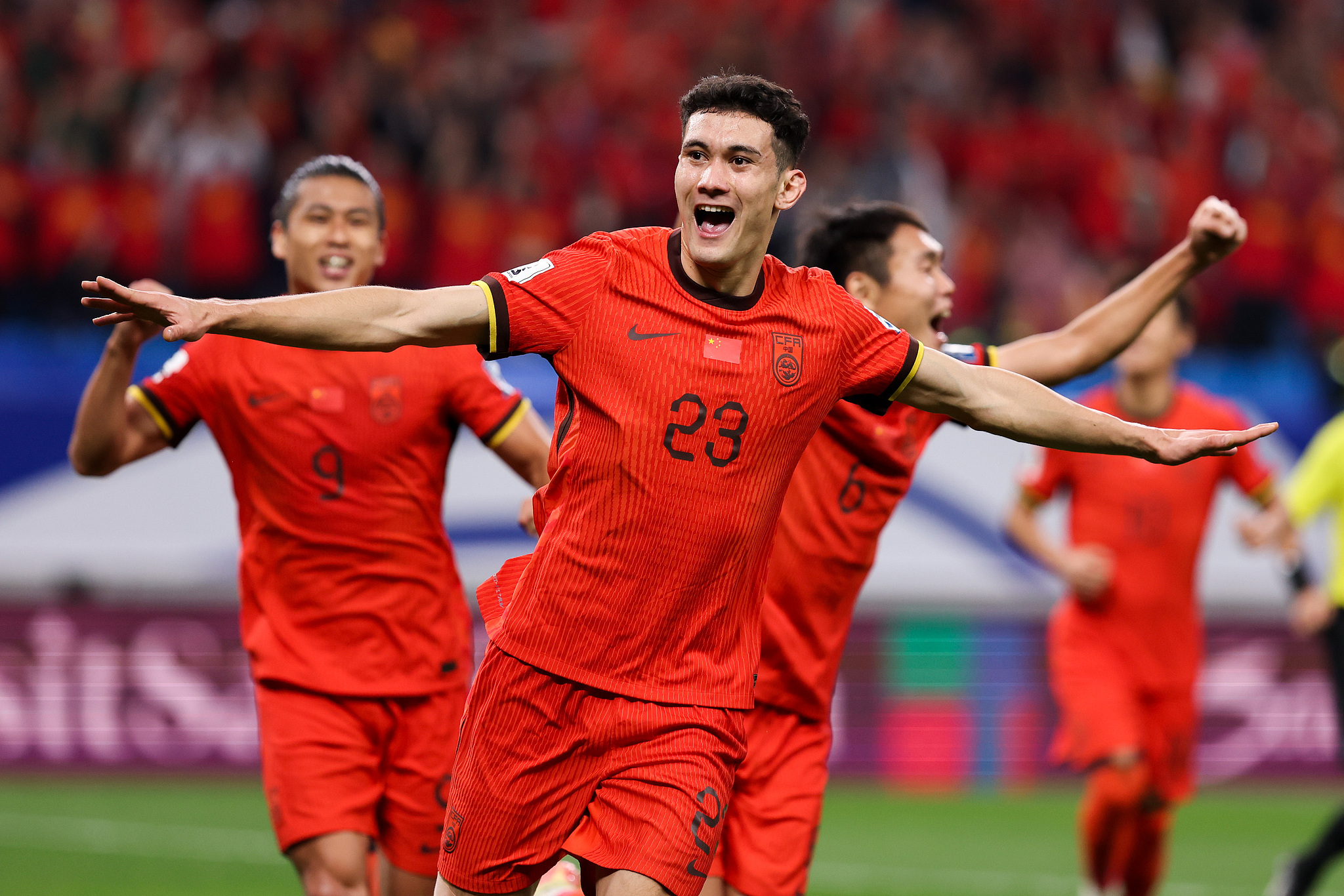 Behram Abduweli (#23) of China celebrates after scoring a goal against Indonesia in a 2026 FIFA World Cup Asian Football Confederation (AFC) Qualifying match in Qingdao, east China's Shandong Province, October 15, 2024. /CFP