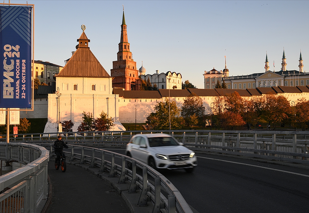 A view shows a banner with the logo of the upcoming 2024 BRICS Summit, with the Kul Sharif Mosque and the Suyumbike Tower at the Kazan Kremlin seen in the background, Kazan, Russia, October 14, 2024. /CFP