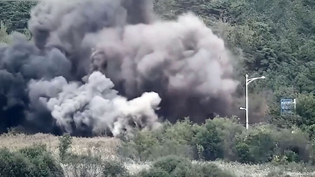 This photo released by the DPRK's official Korean Central News Agency (KCNA) shows an explosion as the army blows up roads and railways connecting to the ROK at an unconfirmed location in the DPRK. October 16, 2024. /CFP