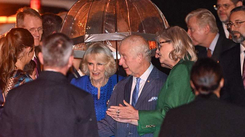 Britain's King Charles III (center R) and Queen Camilla (center L) are greeted upon their arrival at Sydney International Airport in Sydney, October 18, 2024. /CFP