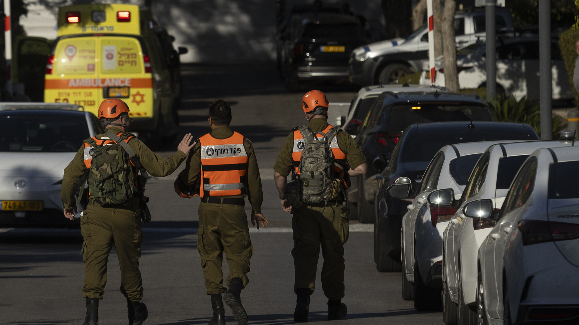 Israeli emergency workers attend the scene after a drone reportedly fired from Lebanon hit a structure in Caesarea, Israel, October 19, 2024. /CFP