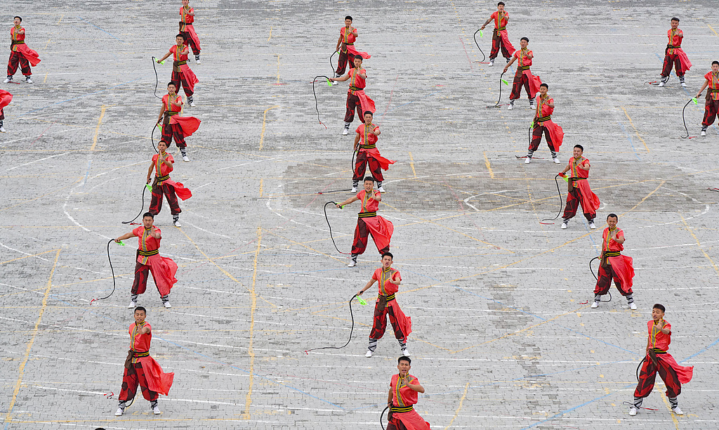 This photo taken on October 19 captures the opening ceremony of the 13th Zhengzhou International Shaolin Wushu Festival in Dengfeng, Henan Province. /CFP