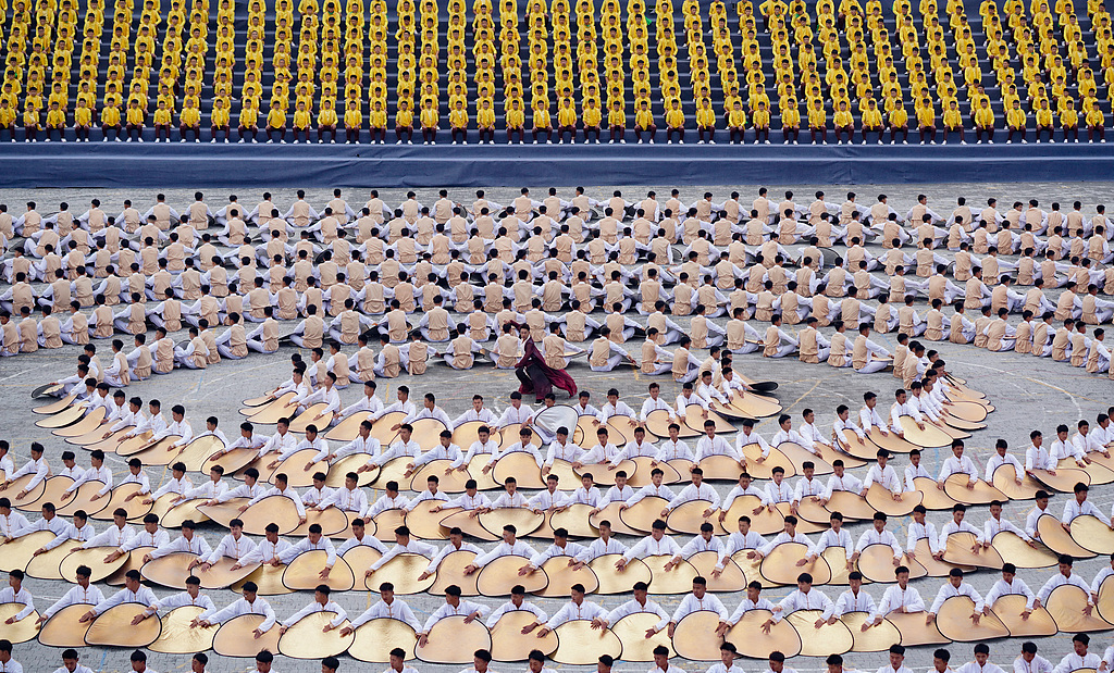 This photo taken on October 19 captures the opening ceremony of the 13th Zhengzhou International Shaolin Wushu Festival in Dengfeng, Henan Province. /CFP