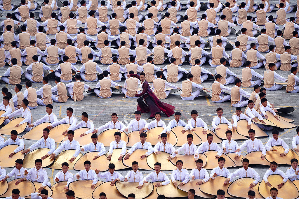 This photo taken on October 19 captures the opening ceremony of the 13th Zhengzhou International Shaolin Wushu Festival in Dengfeng, Henan Province. /CFP