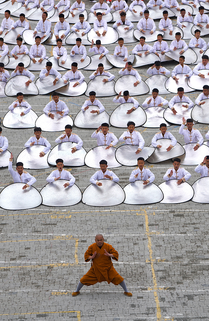 This photo taken on October 19 captures the opening ceremony of the 13th Zhengzhou International Shaolin Wushu Festival in Dengfeng, Henan Province. /CFP