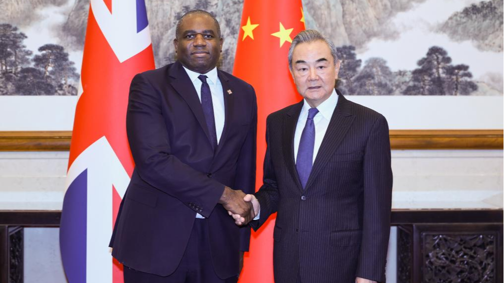 Chinese Foreign Minister Wang Yi, also a member of the Political Bureau of the Communist Party of China Central Committee, shakes hands with British Secretary of State for Foreign, Commonwealth and Development Affairs David Lammy in Beijing, China, October 18, 2024. /Xinhua