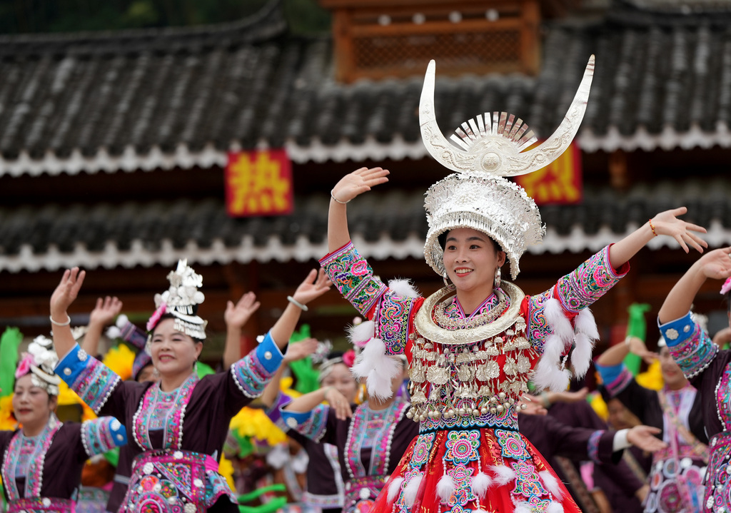 People from local ethnic groups celebrate the 40th anniversary of the founding of Gunbei Dong Township in Rongshui Miao Autonomous County, Guangxi, on October 20, 2024. /CFP