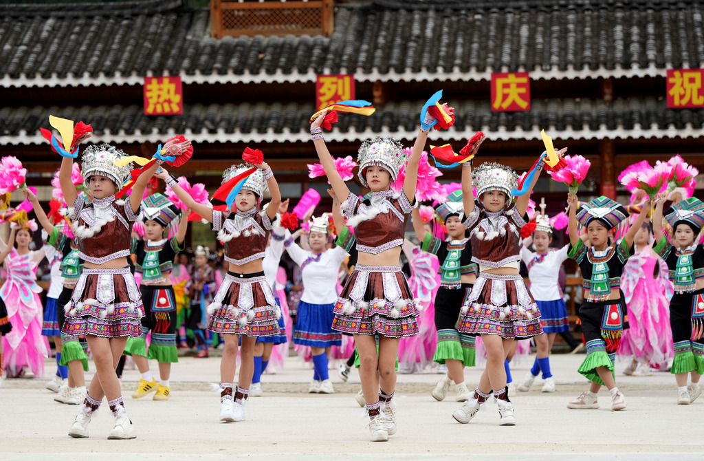 People from local ethnic groups celebrate the 40th anniversary of the founding of Gunbei Dong Township in Rongshui Miao Autonomous County, Guangxi, on October 20, 2024. /CFP