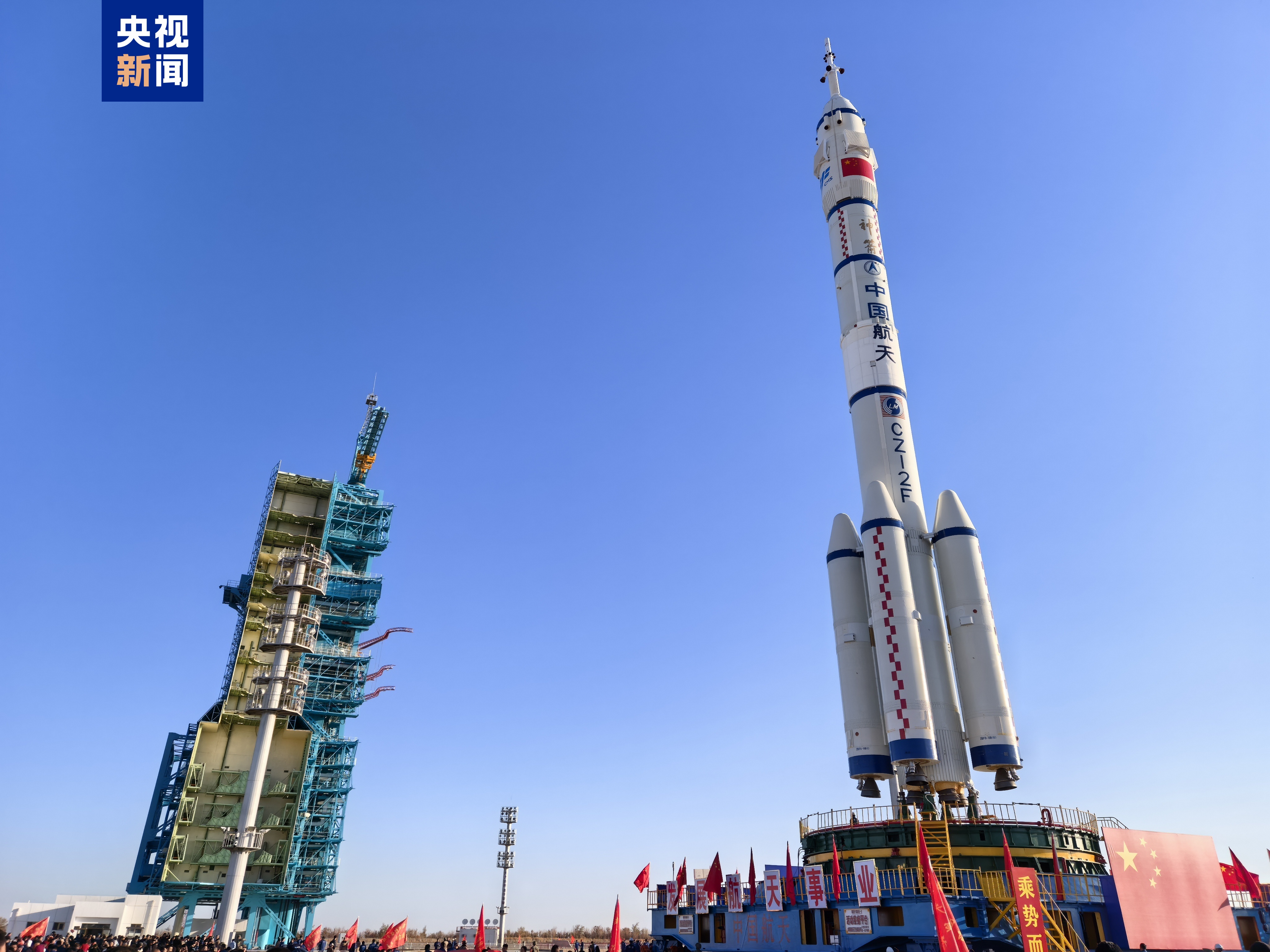 The combination of the Shenzhou-19 crewed spaceship and a Long March-2F carrier rocket was transferred to the launch area, October 22, 2024. /China Media Group