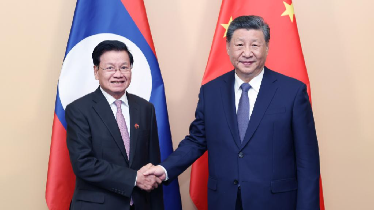 Xi urges China, Laos to forge model for BRI cooperation - CGTN