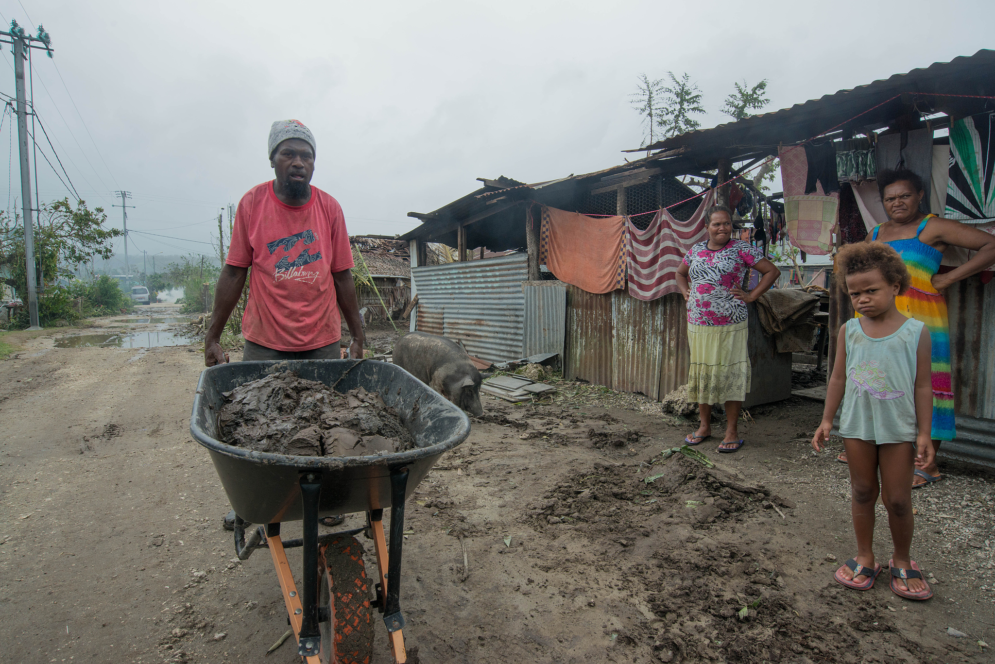 This image provided by UNICEF shows residents contending with storm damage in Mele village, Port Vila, Vanuatu, March 15, 2015. /CFP