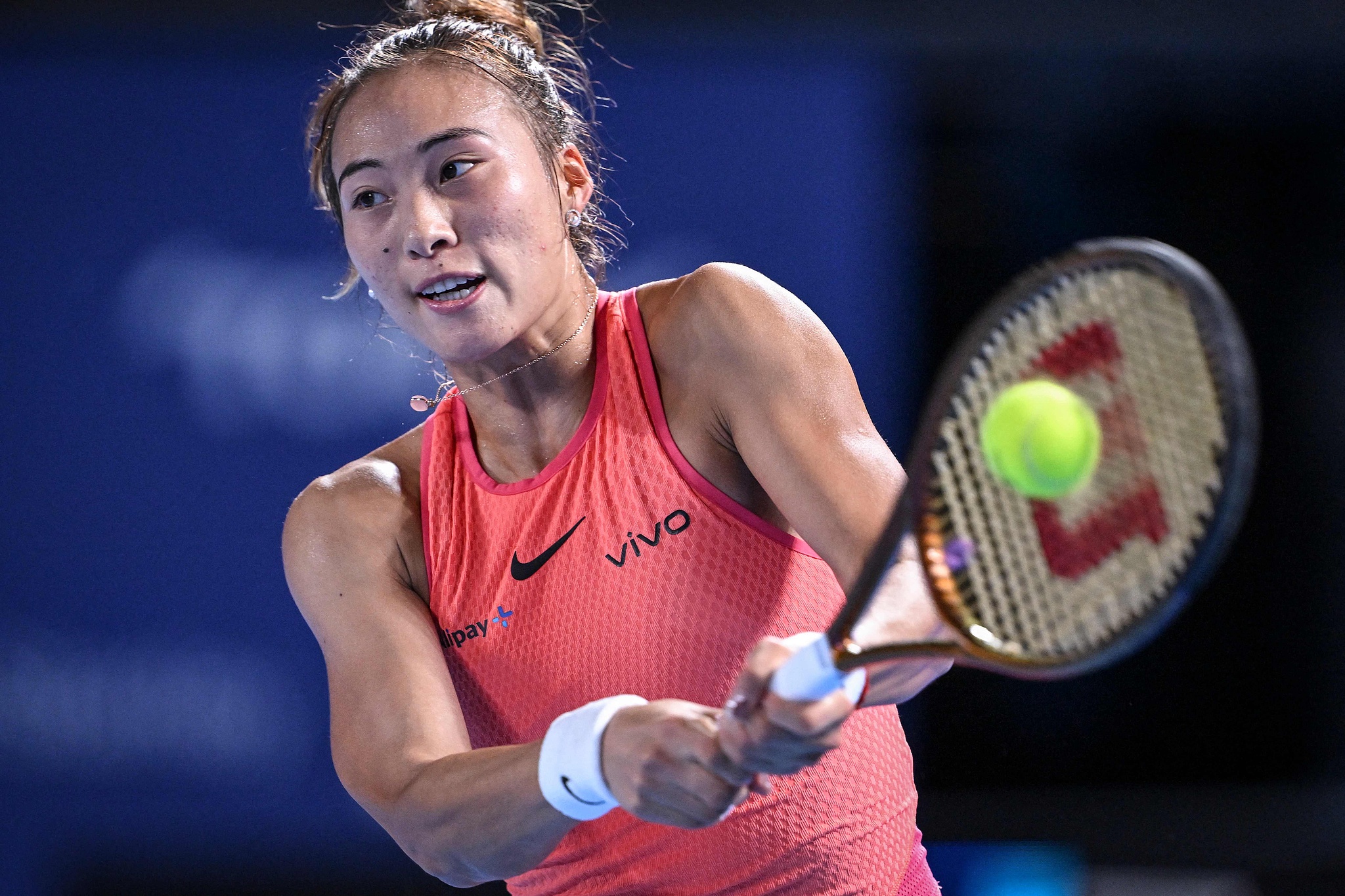 Zheng Qinwen of China hits a shot in the women's singles match against Moyuka Uchijima of Japan at the Pan Pacific Open in Tokyo, Japan, October 24, 2024. /CFP