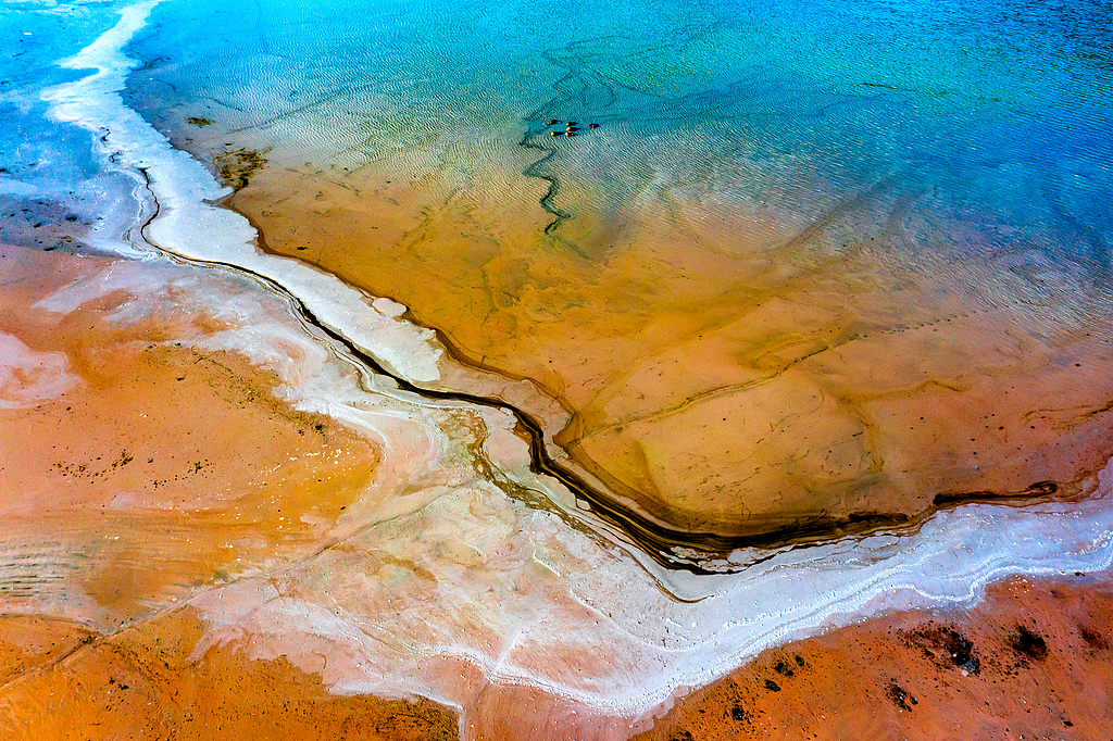 A photo taken on October 25, 2024, shows the colorful copper tailing pond viewed from above in Huangshi, central China's Hubei Province. /CFP