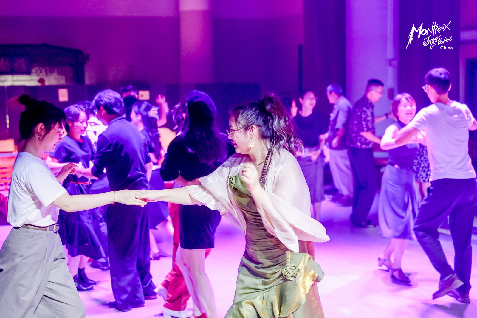 Festival goers sway to the rhythm and enjoy a unique blend of music and dance at the Montreux Jazz Festival China in Suzhou, Jiangsu Province on October 26, 2024. /Photo provided to CGTN