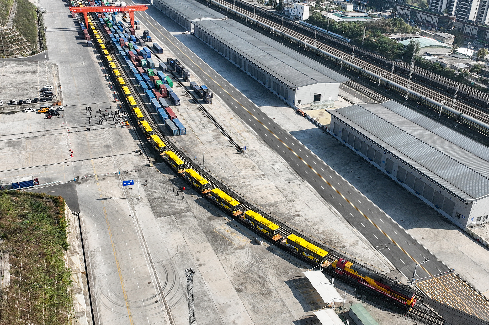 A total of 55 new energy buses are set to be shipped to Laos in two batches, with a second train carrying 27 buses scheduled to depart on Tuesday. /CFP