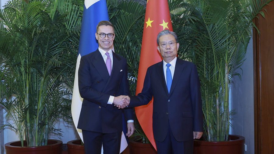 Zhao Leji (R), chairman of the Standing Committee of the National People's Congress, shakes hands with Finnish President Alexander Stubb in Beijing, China, October 29, 2024. /Xinhua