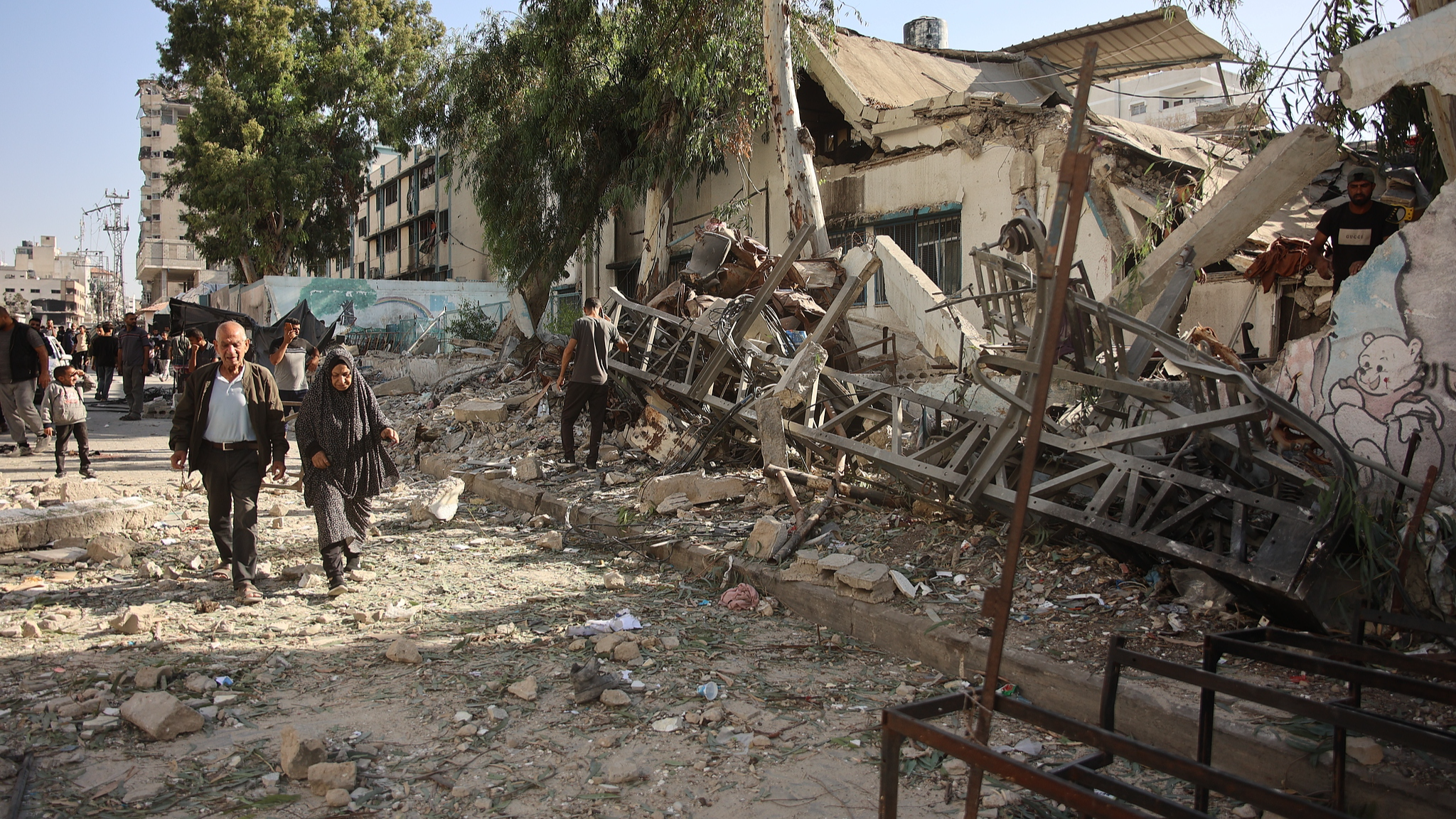 Residents and civil defense personnel conduct search and rescue operations after the Israeli army targeted Asma School, run by UNRWA in the Shati refugee camp in Gaza Strip, October 27, 2024. /CFP