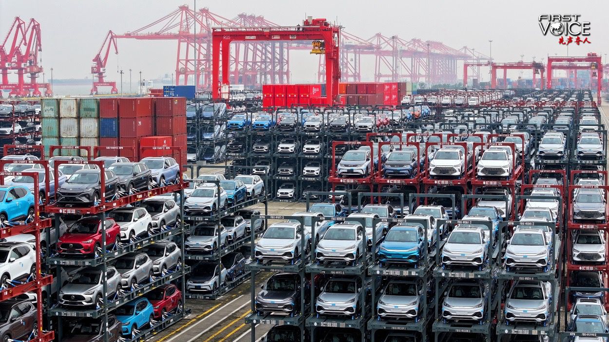 A batch of new energy vehicles wait to be exported at an international container terminal of Taicang Port, east China's Jiangsu Province, December 13, 2023. /CFP