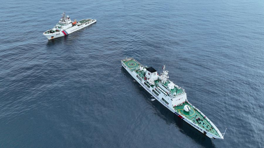 China Coast Guard (CCG) vessel Huayang (R) conducting a drill with another CCG vessel in the South China Sea, May 21, 2024. /Xinhua