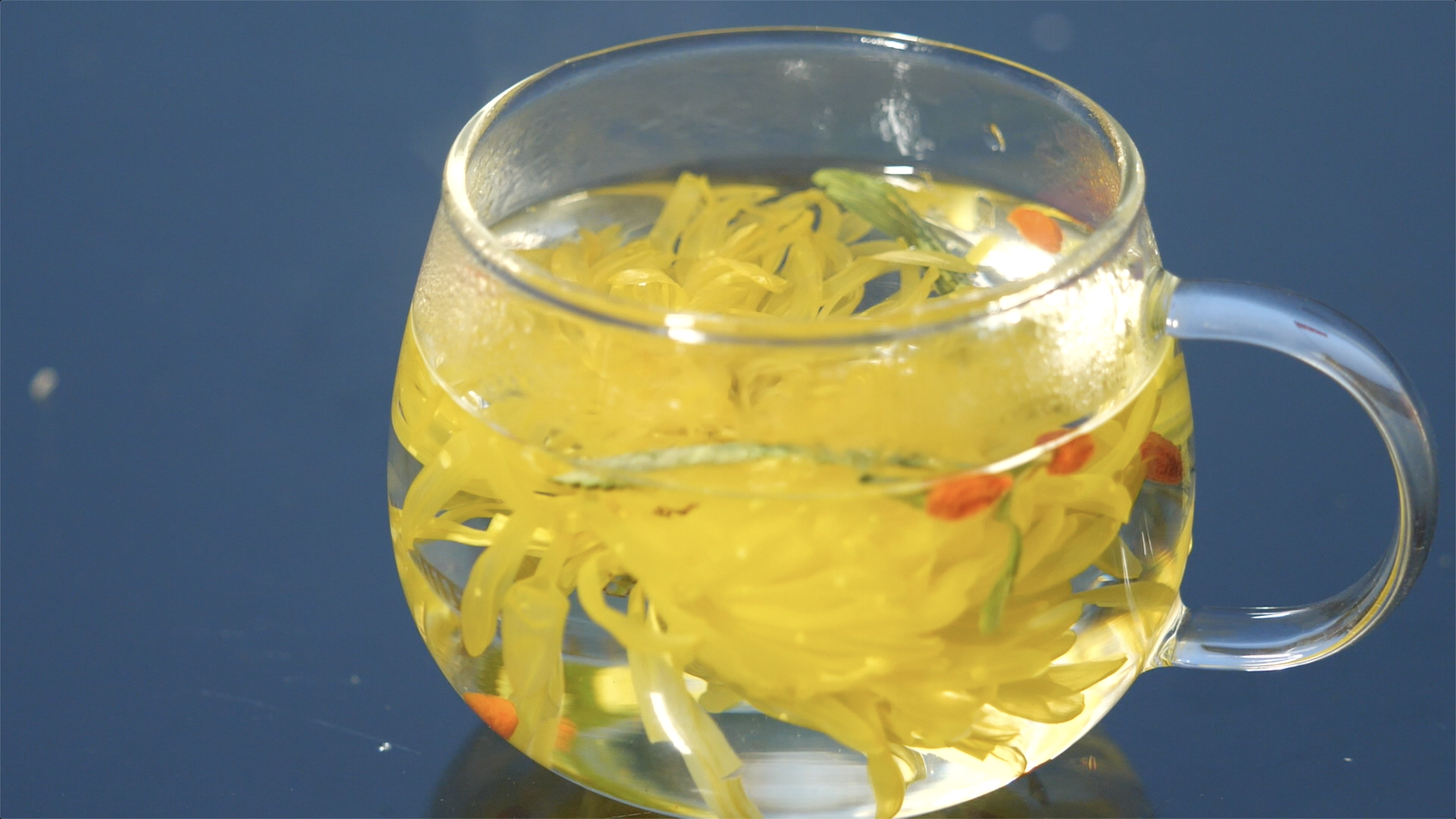 A cup of golden silk chrysanthemum tea is seen in Dejiang County, Guizhou Province. /Photo provided to CGTN