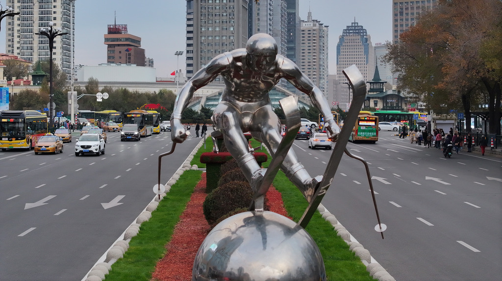 A stainless steel sculpture of a skier is seen on the streets of Harbin, Heilongjiang Province on October 29, 2024. /CFP