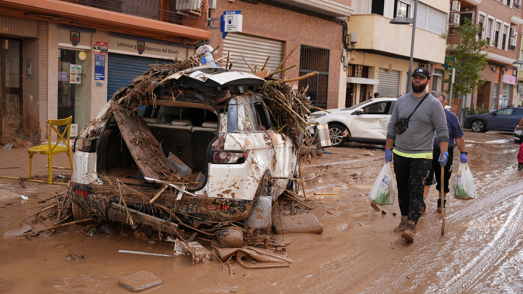 Damaged vehicles seen after catastrophic flash floods caused by heavy rain in the Catarroja municipality of Valencia, Spain, October 31, 2024. /CFP