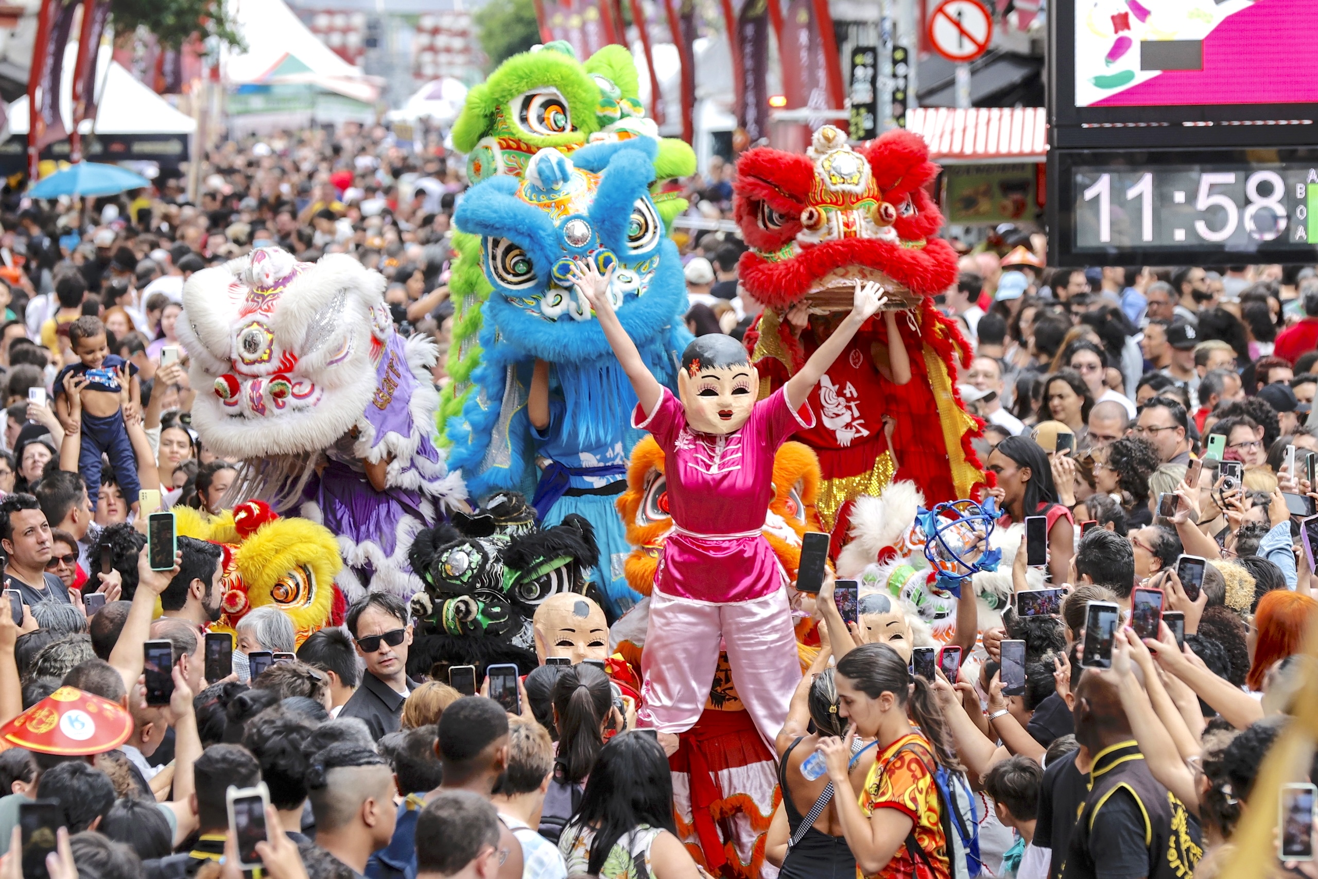 The lion dance is seen during a Spring Festival celebration in 2023 in São Paulo, Brazil. /IC