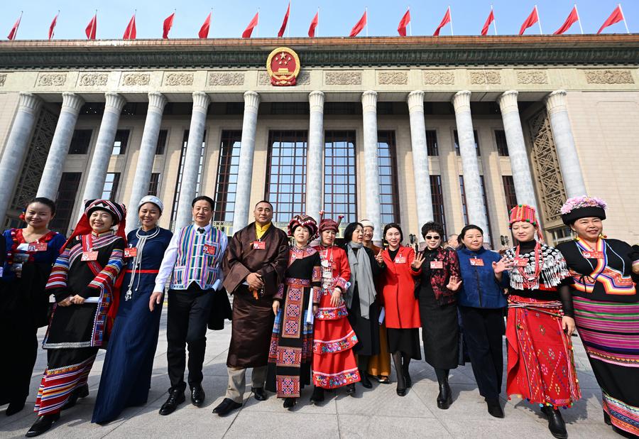 Members of the 14th National Committee of the Chinese People's Political Consultative Conference leave the Great Hall of the People in Beijing, China, after the closing meeting of the second session of the committee, March 10, 2024. /Xinhua