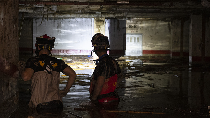 Members of the Emergency Military Unit search for missing people in a residential car park after heavy rain and flooding hit the Paiporta municipality in Valencia, Spain, November 2, 2024. /CFP